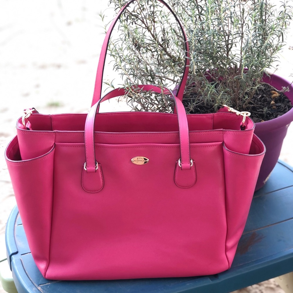 Pink Coach baby bag